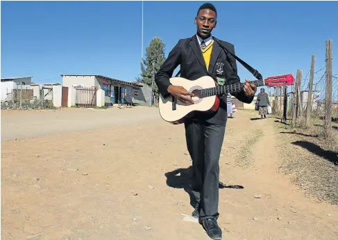  ?? Picture: ZIYANDA ZWENI ?? DESTINED FOR STARDOM: Holy Cross High school Grade 11 pupil Inga Mfono, AKA OBU Mxhosa, has released two singles and will be dropping a full album in September.