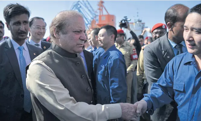  ?? AFP ?? Pakistan’s Prime Minister Nawaz Sharif meets Chinese workers at the multi-billion-dollar Gwadar port, west of Karachi. Funded by a loan from China, the port has remained largely idle.