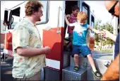  ?? ?? A boy climbs down from the fire truck during National Night Out in Lodi Tuesday Aug. 1, 2017.