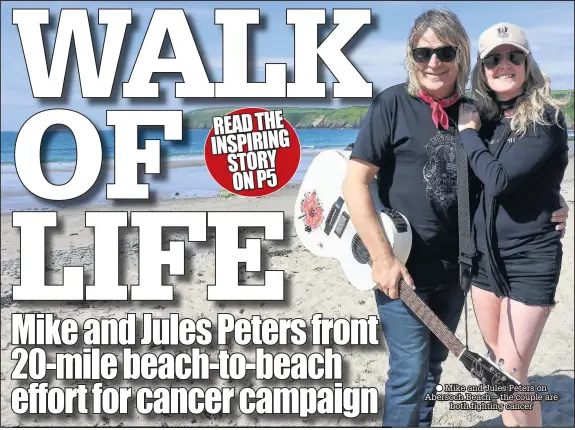  ??  ?? ● Mike and Jules Peters on Abersoch Beach – the couple are both fighting cancer