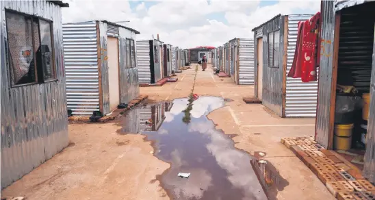  ?? Picture: Nigel Sibada ?? AWASH. Denver informal settlement was flooded by the heavy rains. Residents claim the settlement was filled with water, inside and outside the homes.