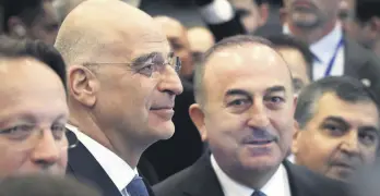  ?? ?? Foreign Minister Çavuşoğlu (R) and Greek Foreign Minister Dendias attend the opening of an internatio­nal donors’ conference to support earthquake survivors in Türkiye and Syria, in Brussels, Belgium, March 20, 2023.