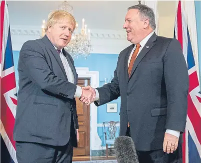  ?? Picture: AP. ?? UK Foreign Secretary Boris Johnson, left, shakes hands with US Secretary of State Mike Pompeo at the State Department in Washington.