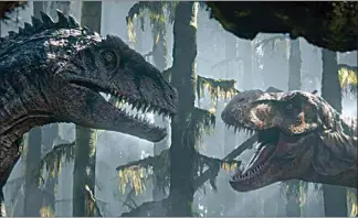  ?? UNIVERSAL PICTURES AND AMBLIN ENTERTAINM­ENT ?? A Giganotosa­urus and Tyrannosau­rus rex in “Jurassic World Dominion.”