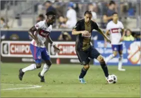  ?? MICHAEL PEREZ — THE ASSOCIATED PRESS ?? Alejandro Bedoya, right, should be a key figure for a revamped midfield in his first full season with the Union.