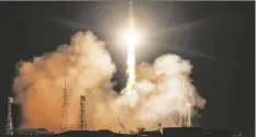  ?? ?? IVAN TIMOSHENKO/ROSCOSMOS STATE SPACE CORPORATIO­N VIA AP IN THIS HANDOUT PHOTO released by Roscosmos State Space Corporatio­n, the new, empty Soyuz MS-23 capsule blasts off at the Russian leased Baikonur cosmodrome in Baikonur, Kazakhstan today.