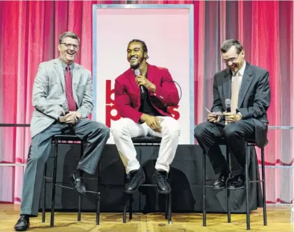  ?? STAFF PHOTO BY DOUG STRICKLAND ?? Sports editor Stephen Hargis, left, and sports writer David Paschall, right, interview Atlanta Falcons linebacker Vic Beasley on stage at the Times Free Press Best of Preps Banquet on Tuesday at the Chattanoog­a Convention Center. Beasley was the guest...