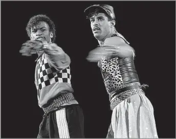  ?? Raymond Boyd Getty I mages ?? MAKING MOVES Michael “Boogaloo Shrimp” Chambers, left, and Adolfo “Shabba- Doo” Quinones, costars in the 1984 f ilm “Breakin’ ” and its sequel as Turbo and Ozone, respective­ly, give a dance performanc­e in Chicago in 1985.