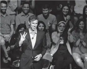  ?? Chip Somodevill­a / Getty Images ?? U.S. Senate candidate Rep. Beto O’Rourke flashes the University of Houston hand sign during a town hall meeting hosted by MSNBC on campus Tuesday.