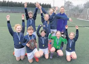 ??  ?? ●● The victorious Marlboroug­h Primary School girls’ football team
