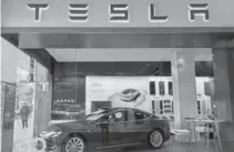  ??  ?? A Tesla Model S. A bill in the Colorado legislatur­e seeks to remove tax exemptions for electric cars.