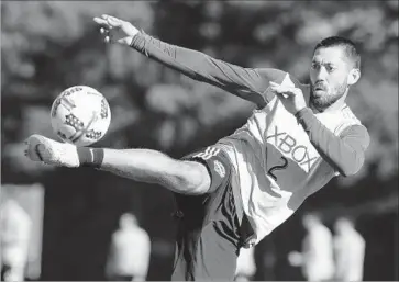  ?? Ted S. Warren Associated Press ?? FORWARD CLINT DEMPSEY missed the last U.S. World Cup qualifier because of an irregular heartbeat. “We know there are some good days still ahead for Clint,” Coach Bruce Arena said of the Seattle Sounders star.