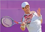  ?? AP ?? Andy Murray of Britain plays a return to Benoit Paire of France during their singles match at the Queens Club tourney in London on Tuesday. Murry won 6-3, 6-2. —