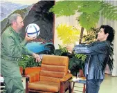  ?? Picture: REUTERS Picture: REUTERS ?? FOOTBALL FANS: Fidel Castro and one of his most famous admirers, Argentinia­n soccer great Diego Maradona, meet in Havana in 2005. The admiration was mutual, even though Castro was more of a baseball player