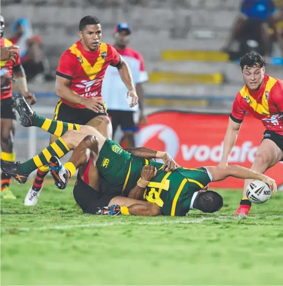  ?? Picture: GRANT TROUVILLE ?? Wade Graham, reaching out to score for Australia against Papua New Guinea at the weekend, hopes to earn a Test debut at the World Cup.