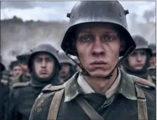  ?? REINER BAJO — NETFLIX VIA AP ?? This image released by Netflix shows Felix Kammerer in a scene from “All Quiet on the Western Front.”