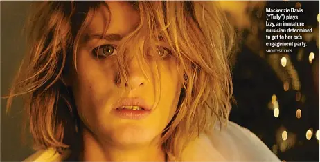  ??  ?? Mackenzie Davis (“Tully”) plays Izzy, an immature musician determined to get to her ex’s engagement party. SHOUT! STUDIOS