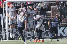  ?? AP ?? Andreas Pereira scored a spectacula­r free-kick in a 4-1 defeat to Liverpool