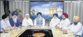  ?? HT PHOTO ?? SGPC chief Gobind Singh Longowal (C), jails minister Sukhjinder Singh Randhawa (2R) and SAD leader Jagir Kaur (3L) during the coordinati­on committee meeting in Amritsar on Tuesday.