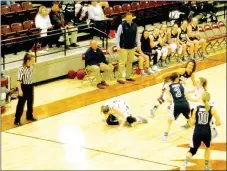  ?? MARK HUMPHREY ENTERPRISE-LEADER ?? Can’t keep a good girl down. Lincoln senior Kendra Cummings picks herself up off the floor after Shiloh Christian guard Rachel Breeding (No. 3) threw an elbow while facing pressure in the front-court. No foul was called on the play. Lincoln battled...