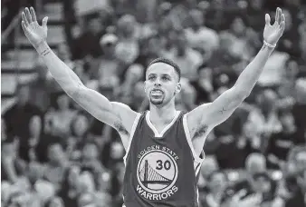  ?? ASSOCIATED PRESS FILE PHOTO ?? Golden State Warriors guard Stephen Curry celebrates during overtime in an NBA game against the Utah Jazz in Salt Lake City. Curry’s $201 million agreement with Golden State will set an NBA total-value record.