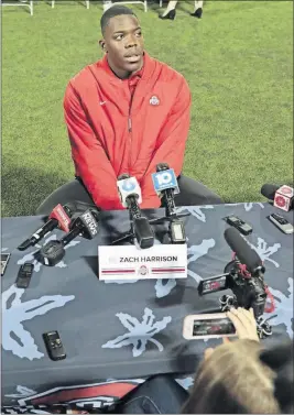  ?? [JOSHUA A. BICKEL/DISPATCH] ?? Ohio State defensive end Zach Harrison, the Olentangy Orange star who signed with the Buckeyes in December, answers questions during a media session on Wednesday at the Woody Hayes Athletic Center.