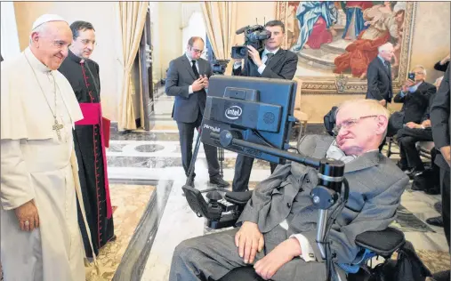  ?? AP FILE PHOTO ?? Pope Francis greets physicist Stephen Hawking during an audience with participan­ts at a plenary session of the Pontifical Academy of Sciences at the Vatican in November 2016.