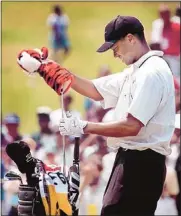  ?? Lance Murphey/the Commercial Appeal files ?? After Tiger Woods won the Masters in 1997, it was thought that his presence would lead to a rise in black youths playing golf. Some 15 years later, that has yet to happen.