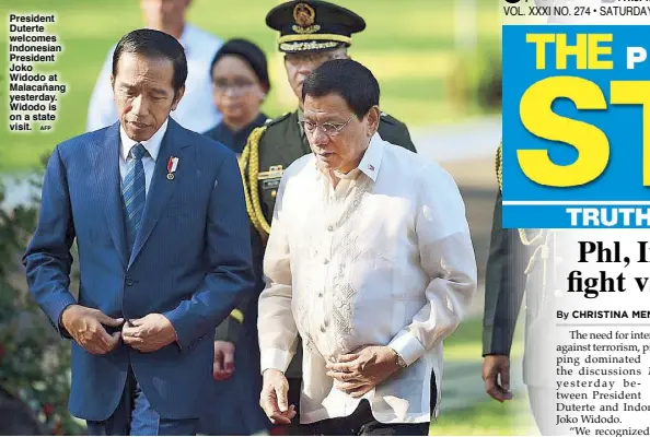  ?? AFP ?? President Duterte welcomes Indonesian President Joko Widodo at Malacañang yesterday. Widodo is on a state visit.