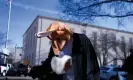  ?? Texas. Photograph: Annie Rice/Reuters ?? Jaime Cruz bangs a gavel in a kangaroo costume during the Women’s March protest outside of the federal courthouse in Amarillo,