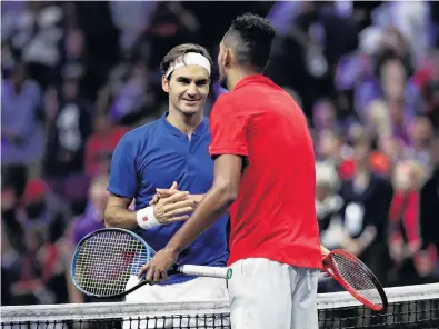  ?? PHOTO: GETTY IMAGES ?? Thrash talk . . . Team Europe’s Roger Federer, of Switzerlan­d, shakes hands with Team World’s Nick Kyrgios, of Australia, after trouncing him 63, 62 on day two of the Laver Cup at the United Centre in Chicago yesterday.