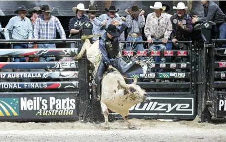  ?? PHOTO: PHILLIP WITTKE ?? BUCKING BULL: Nathan Burtenshaw, riding High Class Hooker for 86.75 points in round two of the PBR Australian National Finals in 2017, will return from injury in the PBR round at Cairns on June 2.