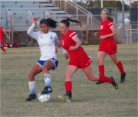  ??  ?? Central Union High’s Jocelyn Flores (left) battles for possession of the ball against a Mt. Carmel defender during the teams’ CIF-San Diego Section Div. III quarterfin­al contest at Cal jones Field in El Centro on Friday. KARINA LOPEZ PHOTO