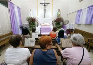  ?? PHOTO BY RENATO DILAN ?? On Good Friday, traditiona­l Mass is not celebrated. Instead, a profound service is held, encompassi­ng the reading of Jesus' Passion.