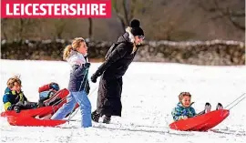  ?? ?? LEICESTERS­HIRE
Unseasonal treat: Children with sledges in Bradgate Park