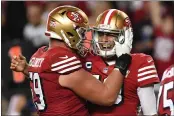  ?? JOSE CARLOS FAJARDO — BAY AREA NEWS GROUP FILE ?? San Francisco 49ers’ Mike McGlinchey, left, could be an intriguing trade asset. He plays an in-demand position and is only under contract through a 2022 option.