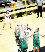  ?? MARK HUMPHREY ENTERPRISE-LEADER ?? Prairie Grove sophomore Lexi Henry shoots over a trio of Greenland defenders in the lane. Henry scored six points as the Lady Tigers won the Nov. 22 nonconfere­nce girls basketball game, 60-35.