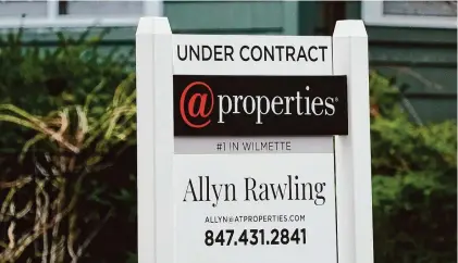  ?? Nam Y. Huh/Associated Press ?? An “Under Contract” sign is displayed at a home in Wilmette, Ill., on March 28. On Thursday, Freddie Mac reported on this week’s average U.S. mortgage rates.