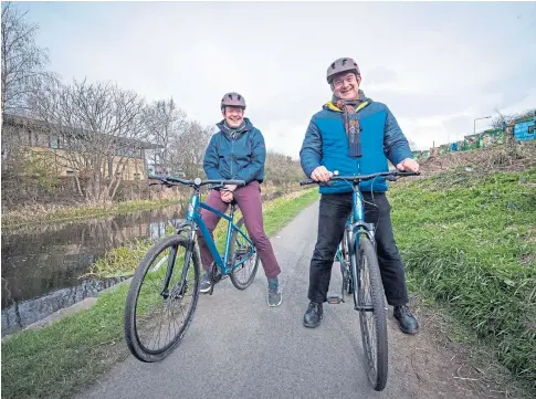  ??  ?? BIKE IT: Scottish Lib Dem leader Willie Rennie and national leader Sir Ed Davey on the campaign trail in Edinburgh.