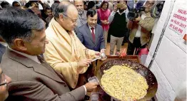  ??  ?? Union finance minister Arun Jaitley taking part in the ‘Halwa Ceremony’ to mark the beginning of printing of budgetary documents, in New Delhi on Thursday. — PTI