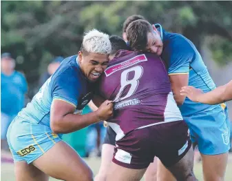  ?? Pic Mike Batterham ?? Titans U19 players Sione Fotuaika and Ryan Foran make a tackle.