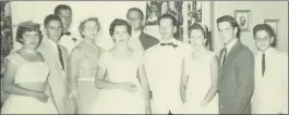  ?? COURTESY OF RICH ARCHBOLD ?? Rich Archbold, second from the left, and his seven siblings at his sister Joan’s wedding in 1956. His grandmothe­r is standing next to Joan, and his father is wearing the tuxedo.