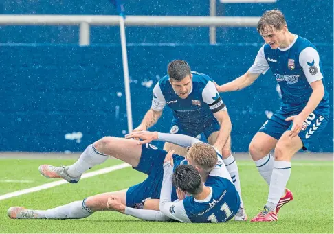  ??  ?? LOOKING UP: Russell Mclean celebrates after he equalises in the 2-1 win against Greenock Morton on Saturday.