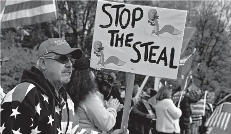  ?? PAULA BRONSTEIN/AP ?? President Trump’s supporters protest against presumptiv­e President-elect Joe Biden’s win Saturday in Salem, Oregon.