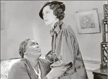  ?? UNIVERSAL PICTURES ?? In the 1934 film “Imitation of Life,” Fredi Washington, right, plays the daughter of Louise Beavers, left, and breaks her mother’s heart by passing as a white woman.