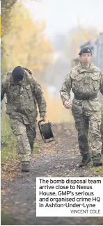  ?? VINCENT COLE ?? The bomb disposal team arrive close to Nexus House, GMP’s serious and organised crime HQ in Ashton-Under-Lyne