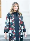  ?? Reuters-Yonhap ?? U.S. first lady Melania Trump walks out to receive the White House Christmas tree at the White House in Washington, in this Nov. 25 photo.