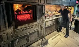  ?? Fuller/VWPics/Alamy ?? Eating steak grilled on a parilla, or outside on an asado (barbecue) is a national tradition, and Argentinia­n restaurant­s typically offer a huge variety of grilled meat. Photograph: Jon G