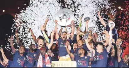  ??  ?? Monaco players celebrate winning their first French league title in 17 years at the end of yesterday’s match against St Etienne. – AFPPIX