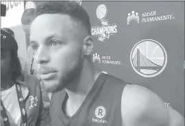  ?? JANIE MCCAULEY — ASSOCIATED PRESS ?? Stephen Curry takes questions from the media after President Donald Trump denounced protests by NFL players and rescinded the Warriors’ White House invitation on Saturday.